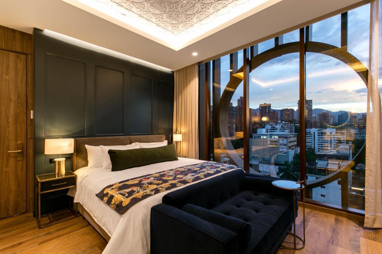 Hotel Marquee Medellín Exteriör bild A bedroom at the hotel